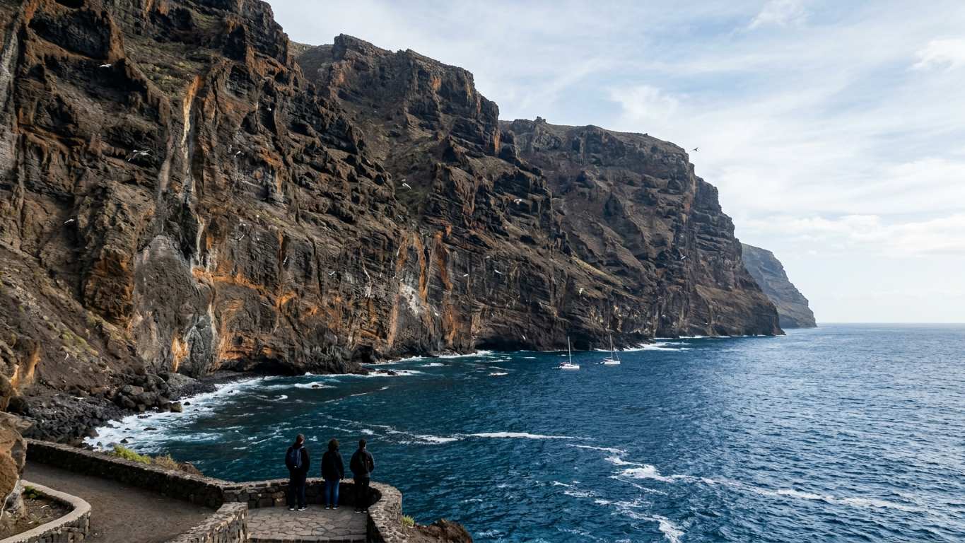 Los Gigantes cliffs rising vertically from deep blue ocean water