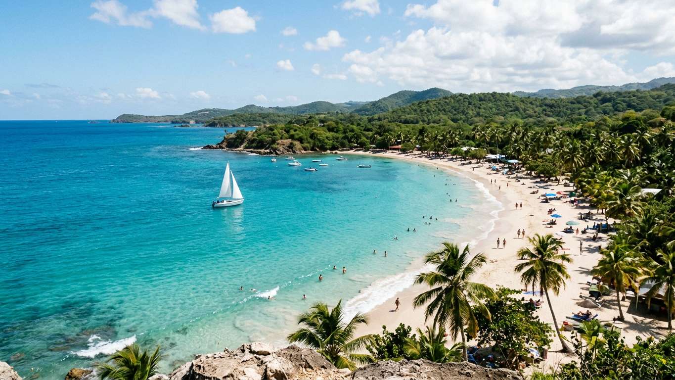Coastal scene with sailing boat on turquoise water near palm-lined shore